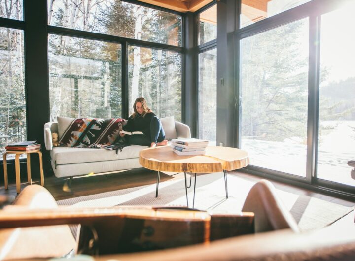 man and woman sitting on brown wooden chairs